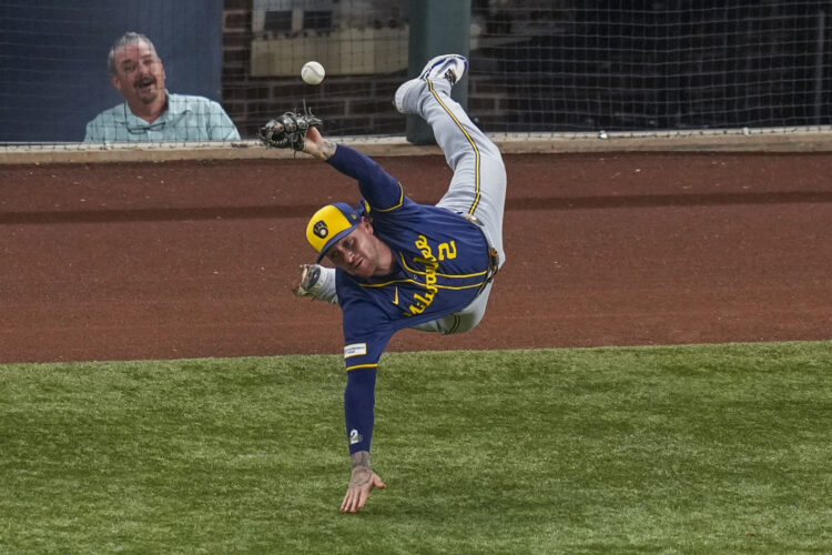 Helman's grand slam pushes playoff-chasing Rangers past Brewers